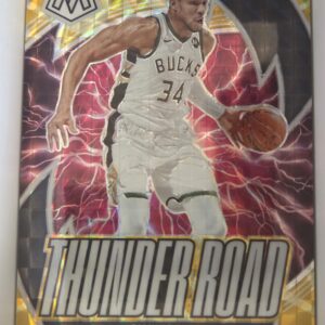 Front of 2023-24 Mosaic Thunder Road Giannis Antetokounmpo #6 yellow parallel numbered 30/99